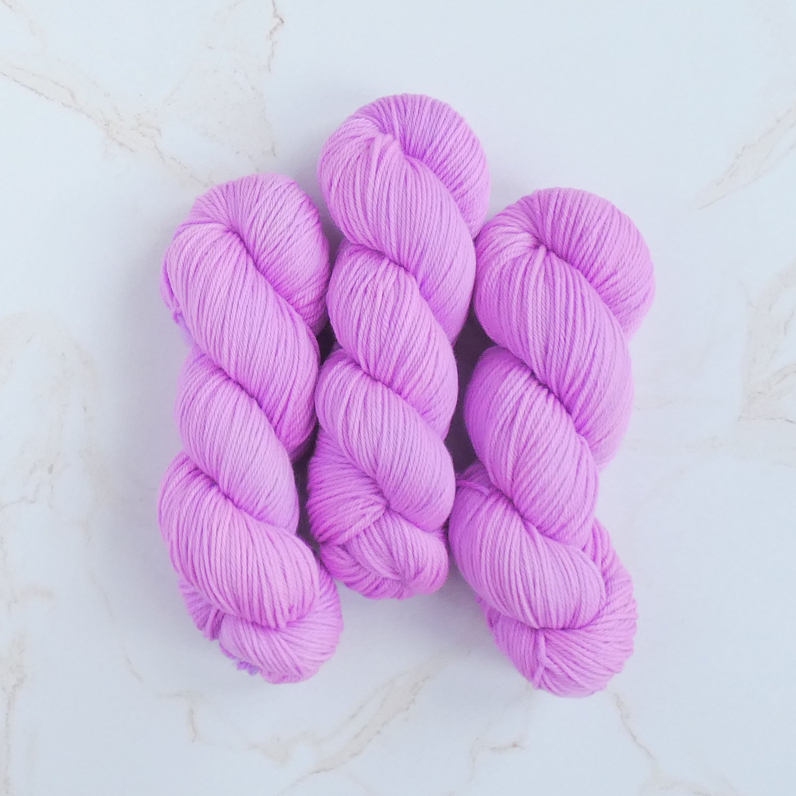 4-ply Merino DK Yarn - Apricot by The Wandering Flock, soft and vibrant Merino wool perfect for knitting and crochet projects.