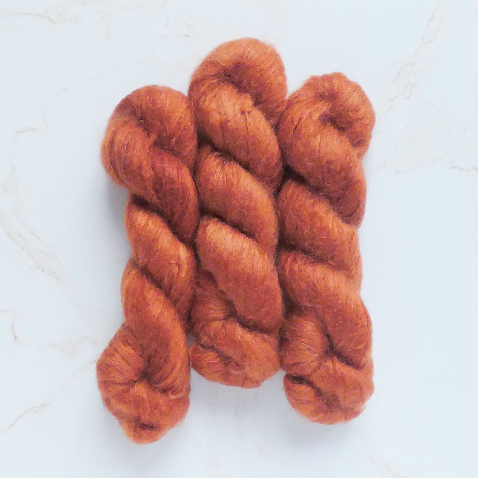 The Wandering Flock Mohair Lace Yarn - Neon Lilac Colorway
