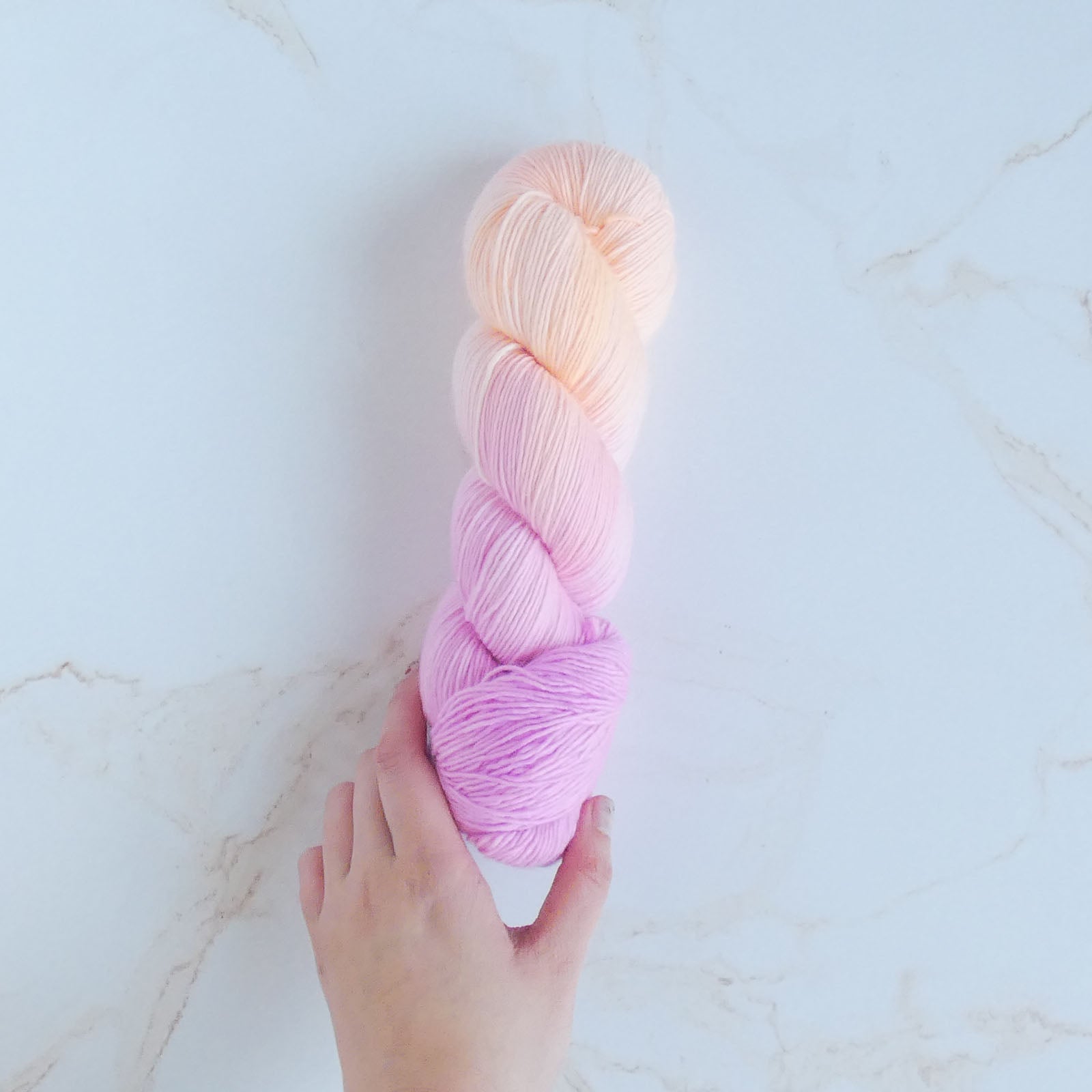 Peach Melba: A Hand-Painted Yarn That Shines in the Melody Sweater by Miki Teragaki