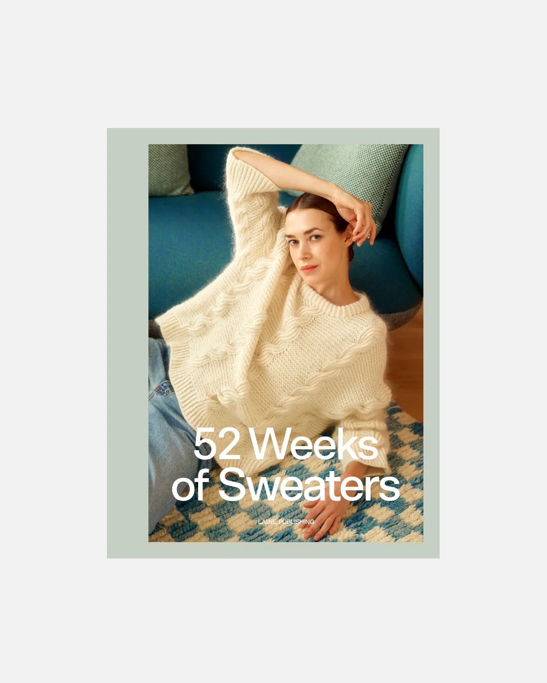Cover of the book "52 Weeks of Sweaters" featuring a person wearing a white, cable knit sweater on a white background.