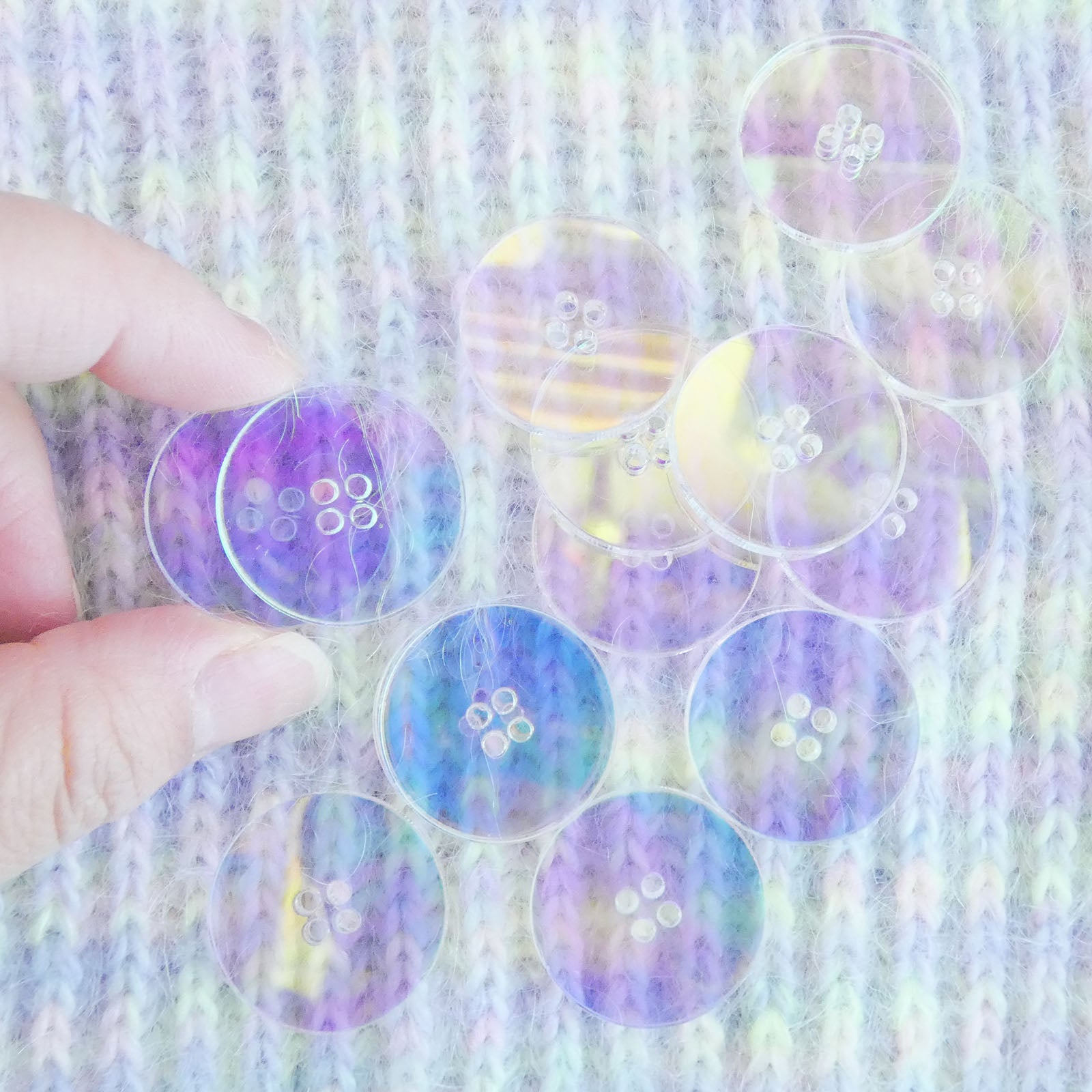 The Wandering Flock’s Small Holographic Buttons (5/8") with a shimmering finish