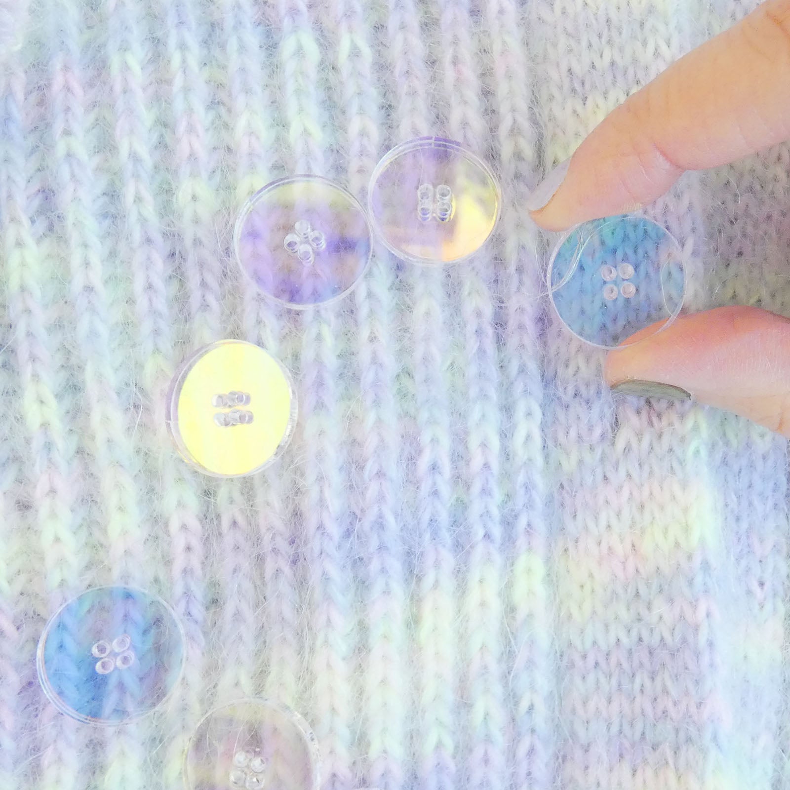 Add a radiant touch to your craft with The Wandering Flock's Small Holographic Buttons (5/8"), designed to catch the light beautifully.